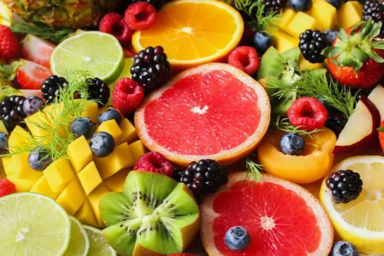 Different types of fruit presented together as a healthy addition to drinking water.