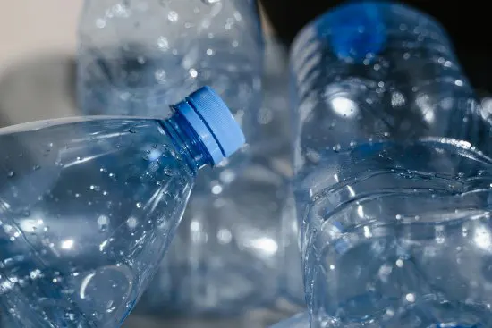 Empty mineral water bottles highlighting the difference between mineral water and tap water.