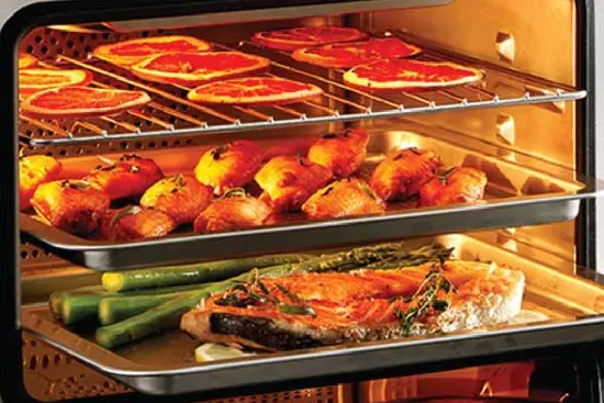 Open steam oven with a freshly prepared, delicious meal free of limescale problems.